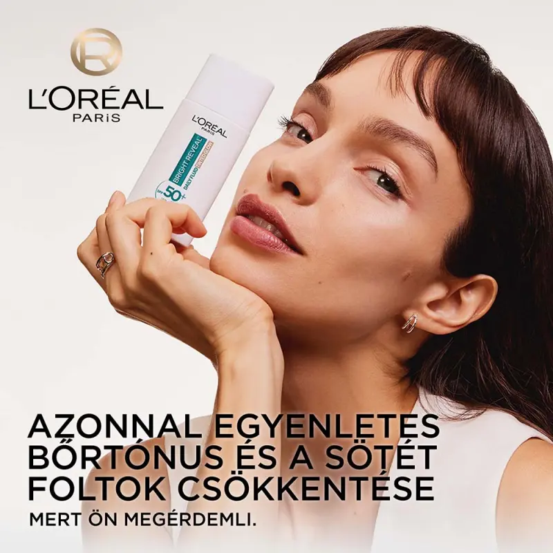Bright Reveal ragyogást adó, színezett fluid SPF50 fényvédővel sötét foltok ellen 50 ml